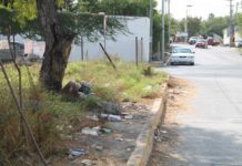 Usan terreno baldío como basurero