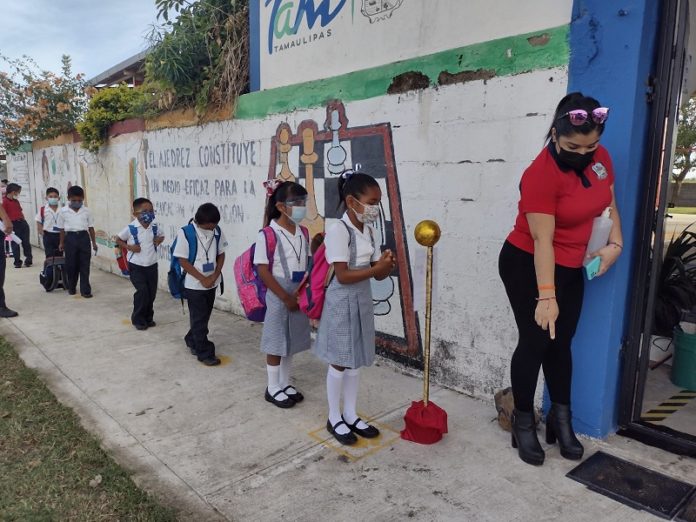 regresan a esceula covid