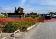 Hallan cadáver de mujer en predio baldío en colonia popular