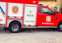 Bomberos atienen llamado de conato de incendio en estacionamiento