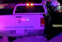 Hallan cadáver en la calle y cercas de un tianguis popular